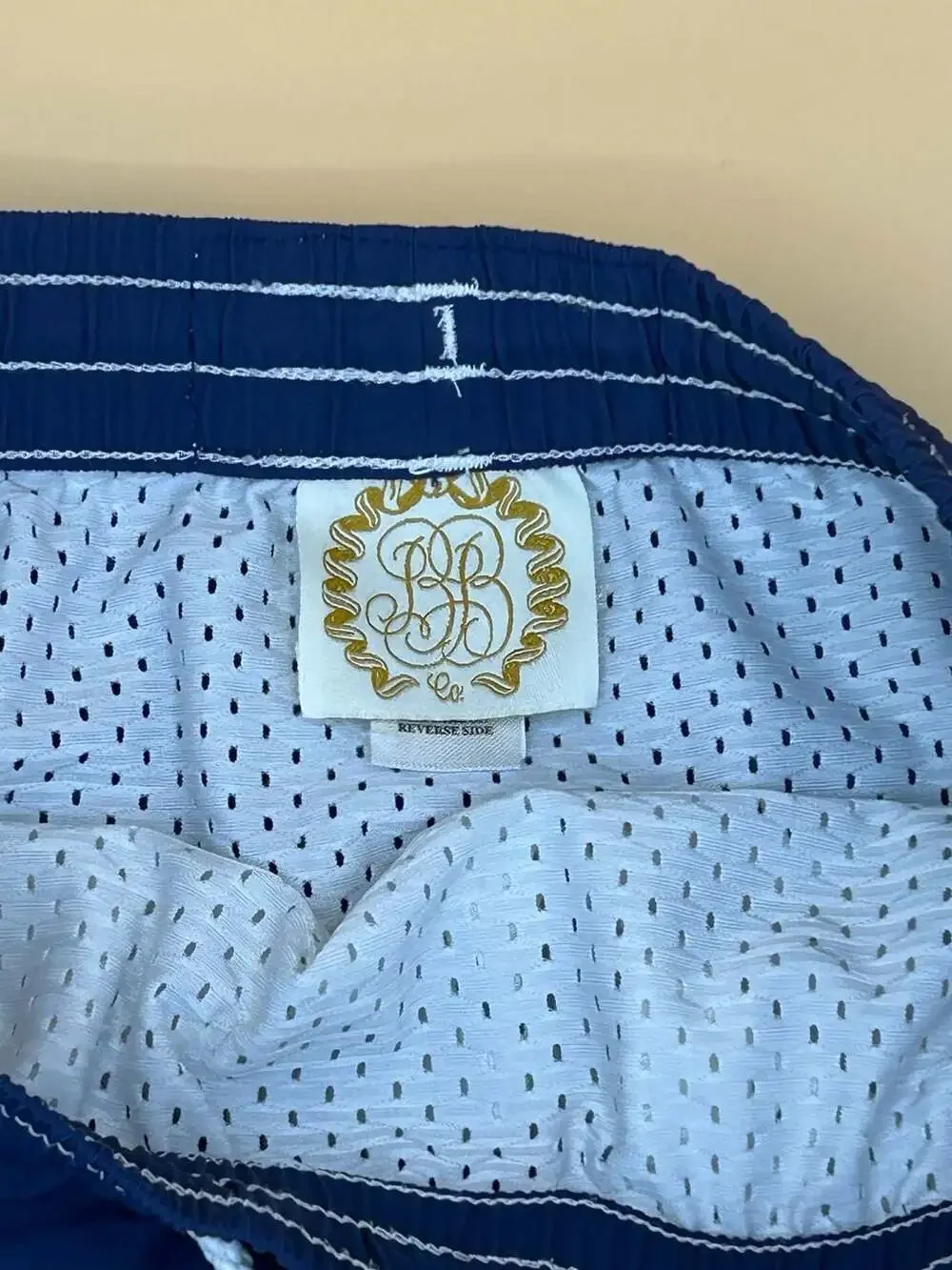 The Beaufort Bonnet Company Blue Boys Swim Trunks with Pelican Embroidery